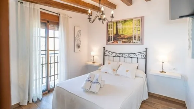 Upstairs double bedroom with wooden beams
