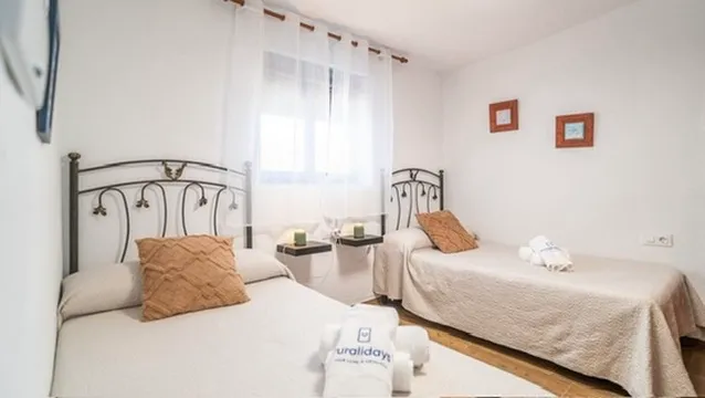 Downstairs bedroom with two single beds